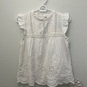 White eyelet ruffle tank